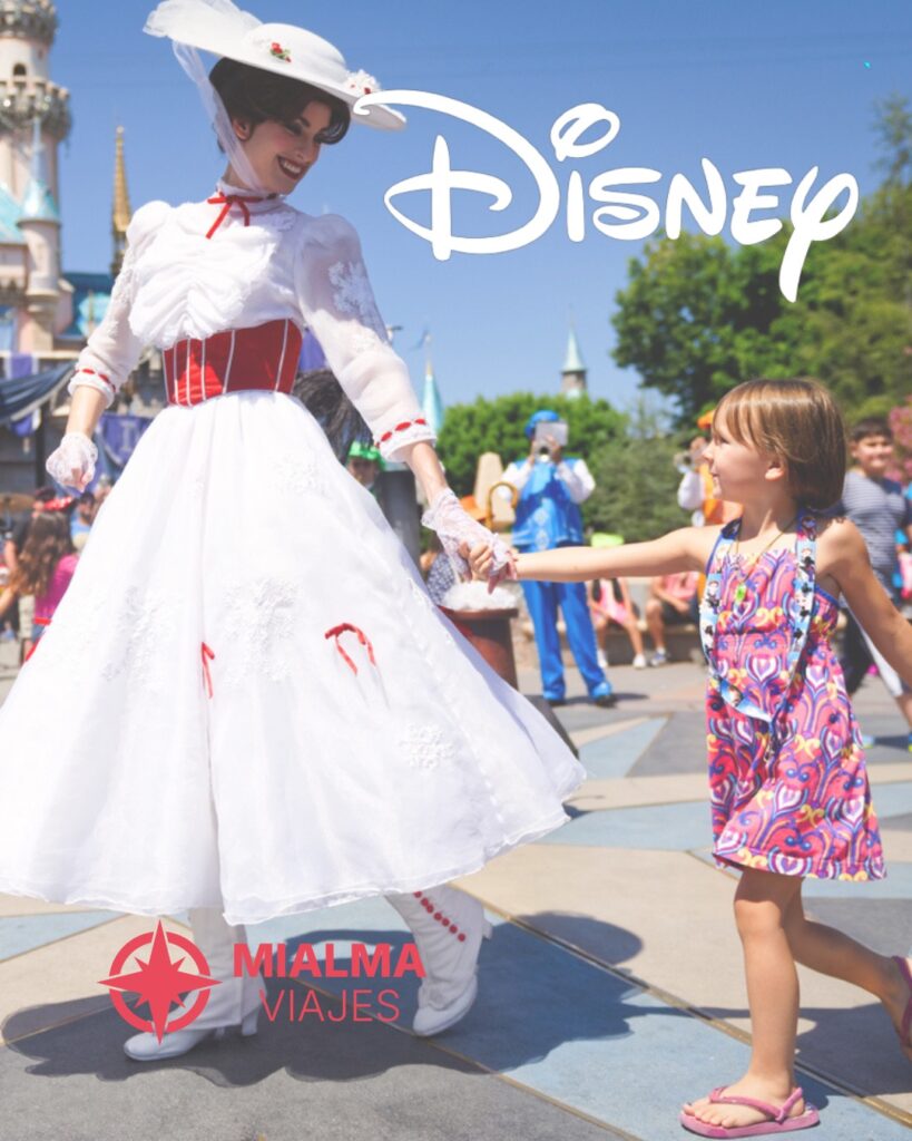 Fotografía de niña con Mary Poppins en Disney World. Logo de Mialma Viajes en la esquina izquierda.